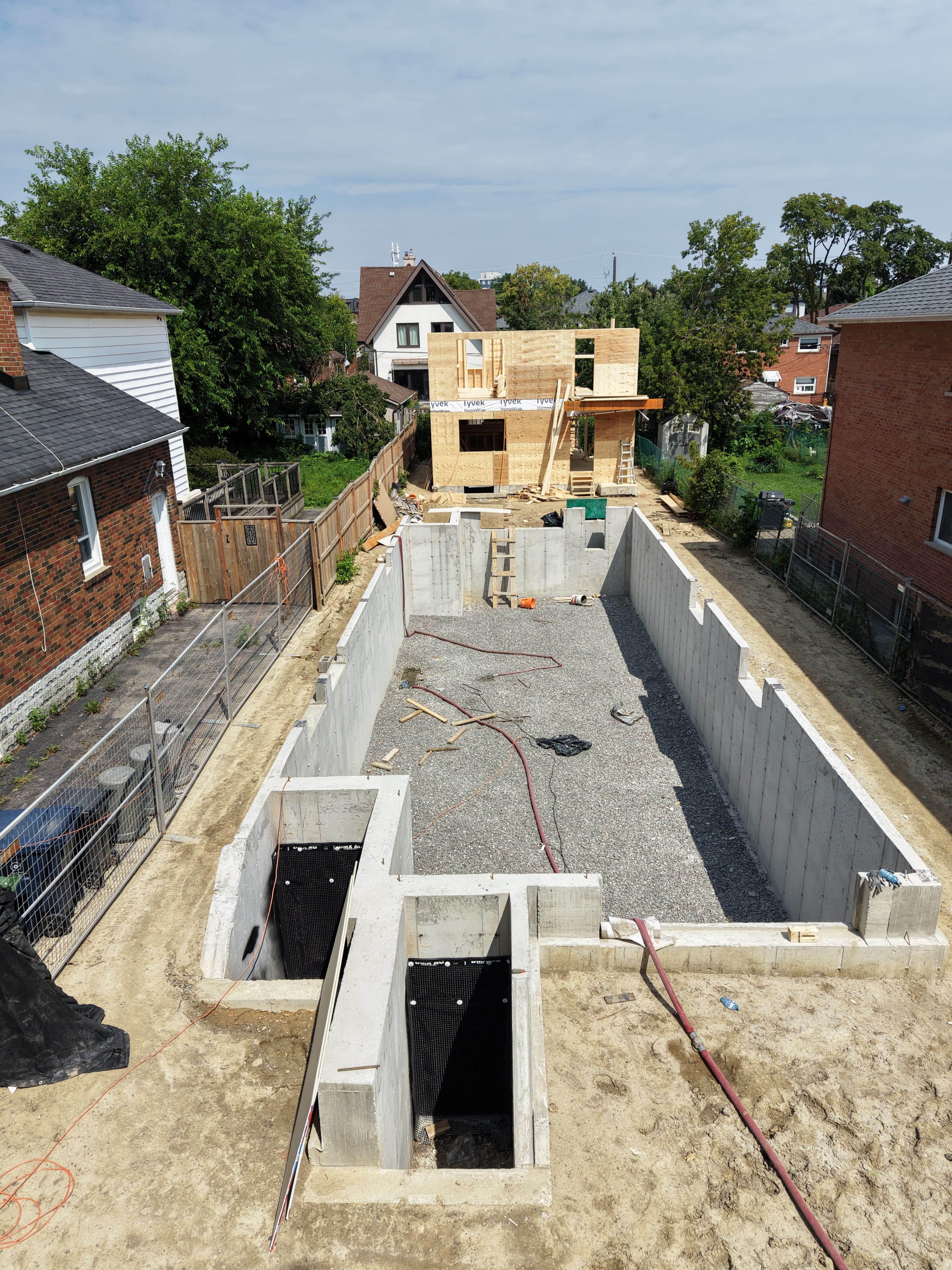 Mimico 01 concrete foundation and framing progress, angle one